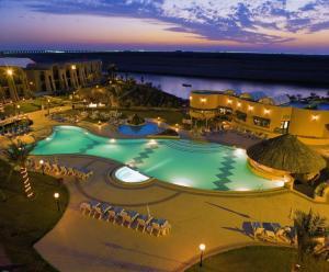 Отель Golden Tulip Al Jazira Hotel & Resort