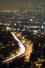 Вид на ночной Лос Анджелес с улицы Малхолланд Драйв .